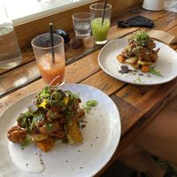 Spicy Cauliflower Fritter with Tofu and Pumpking. Passionfruit & Green pressed juice  at Little Lefroy's in South Fremantle