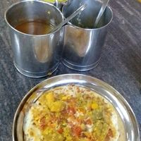 I ordered a tomato uttapam w/out onions, and indeed there were more tomatoes in it than I've eaten in three months in SL. at Akshathai in Jaffna