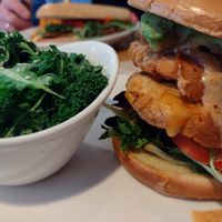Chicken Bacon Avo club with side of kale. So much avocado you can't see under the bun! at Native Foods - The Loop in Chicago