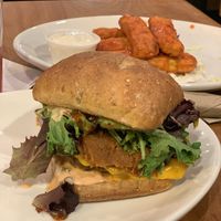 Double burger with vegan cheese / made-of-plants chicken wings at the back at Native Foods - The Loop in Chicago