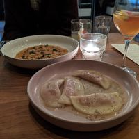 Beet stuffed "pasta" and risotto main courses at Osteria Du in Toronto