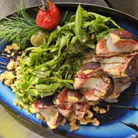 baked figs filled with cream cheese, arugula, balsamic vinegar, and walnuts (9.5, temporary offer only) at Haus Am Park in Bad Soden-salmuenster