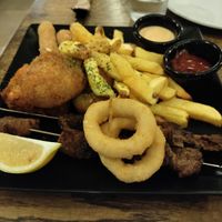 Mixed plate with arancini, skewers, cheese sticks and more at aTipico in Palermo