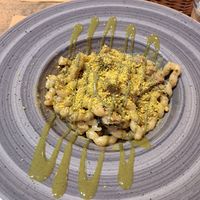 Pasta with a creamy Sauce of pistacchio, Zucchini and small pieces of Tofu at aTipico in Palermo