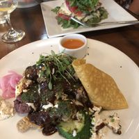 Mushroom mole with blue corn veggie tamale  at Plant in Asheville