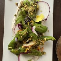 Shishido peppers with warm, cashew cream cheese  at Plant in Asheville