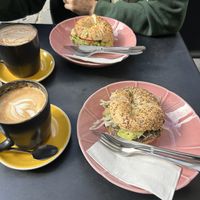 Avocado & bean bagels with soy coffees  at Five Points in Melbourne