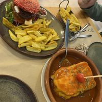 We had the burguês burger and francesinha. The bread on both was just amazing and a staple of the meals.   at Guará in Vila Nova De Gaia