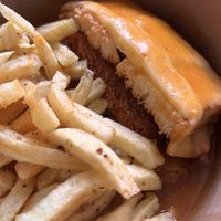 Francesinha con sus patatas y salsa corte  at Guará Restaurant & Bakery in Vila Nova De Gaia