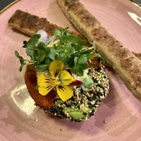 Avo garden: a halved avocado filled with hummus and served with pita sticks  at The Avocado Show in Leidschendam