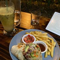 Vegan burrito with a passion fruit smoothie at Kinsu in Uvita