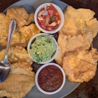 Patacones were excellent, guacamole, salsa, and beans all really fresh and delicious! at Kinsu in Uvita