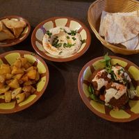 (from left to right) Fatayer, Batata Harra, Humus, Flatbread & Falafel at Aubergine - Maybe closed in Bamberg