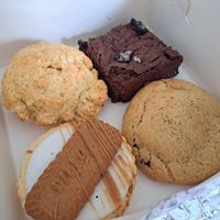 Scone (delicious!!!) Oreo brownie, biscoff empire and stuffed cookie. This was last time...today we got the raspberry and lemon empire deluxe and a slutty brownie , both incredible at Plant Blonde in Glasgow