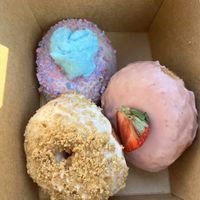 Cotton candy, strawberry, and snickerdoodle donuts  at Cloudy Donut Co. - Charles St in Baltimore