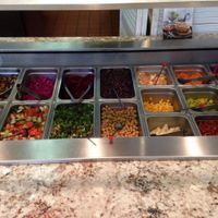 Oooo toppings!! at vfalafel in Washington