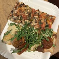 mushroom marinara pizza (top) and cashew sauce, arugula, sun dried tomatoes (bottom)  at La Prezzemolina in Rome