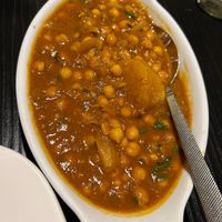 Chana Ghugni. Great vegan protein with a tangy medium-heat sauce. Note the Chana masala is made with yoghurt  at Taste of India in Isle Of Skye