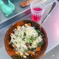 Chilaquiles pasilla y morita con barbasoya  y agua del día   at Mandragora Vegan in Mexico City