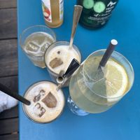 iced latte with oat milk and limoncello spritzz  at Cafe Lozzi in Munich