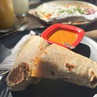 soy chorizo burrito with delicious hot sauce   at Northswell Sabor Natural in Sayulita