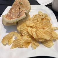 Happy Panini and kettle chips on the side   at Sabor A Vida Cafe & Deli in Vista