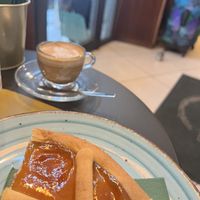 Macchiato + apricot pie  at Verso Coffice Catania in Catania