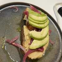 Avocado toast, hummus base  at Verso Coffice Catania in Catania