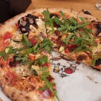 Vegetable pizza made with vegan cheese at Pinokio Pizzeria in Zakopane
