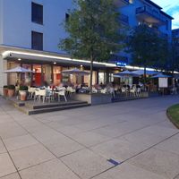 Outdoor seating at Uno e più in Kriens