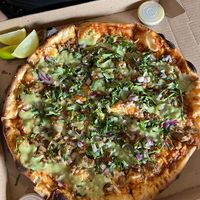 Pizza Suadero - Vegan Meat, Onions, Coriander, Guacamole & Lime at Salvaxe in Mexico City
