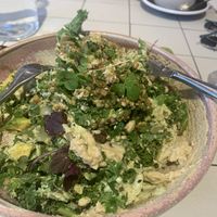 Green Bowl w/ Hummus, Kale, Broccolini, Buckwheat, Almonds, Avocado, Herbs, Pickled Cucumber, Green Tahini Dressing, Dukkha   at Nine Yards in South Melbourne