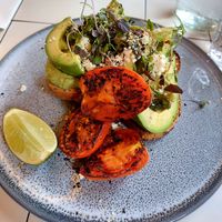 Avo toast + tomato at Nine Yards in South Melbourne