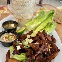 Vegan beef jerky with sticky rice.  at Teacoffhut in Los Angeles
