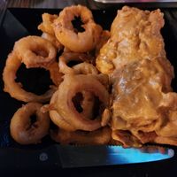 Vegan chimichanga and onion rings at Torque Grill & Cantina in Burleson
