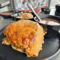 Stacked enchiladas with rice and beans  at Torque Grill & Cantina in Burleson