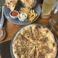 “Pere and zola” mini pizza and guillo panini (tempeh and pesto)   at Kasto in Canggu