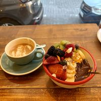 Açaí bowl and oat cappuccino   at umami in Madrid