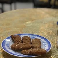 Seitan appetizer. Different from menu picture. From a bag, probably not worth it unless you're craving them. at D'Vegan in Dallas