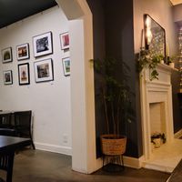 Displayed art for sale. at Botanical Plant-Based Fare in Charlottesville