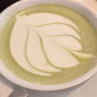 Matcha latte with nice art! at Botanical Plant-Based Fare in Charlottesville