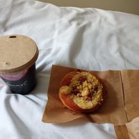 Oat milk latte and strawberry and rhubarb doughnut at Sammys Berliner Donuts in Berlin
