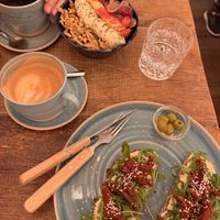 Oat cap, vegan oatmeal & sourdough with hummus   at Lighthouse Café in Bonn