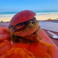 Smoked burger with patacones instead of fries at Don Sanduchito in Puerto Villamil