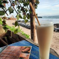 Guanábana juice, vegan menu and beach view at Don Sanduchito in Puerto Villamil