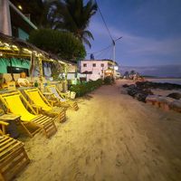 Restaurant on the left, right on the beach at Don Sanduchito in Puerto Villamil