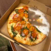 Small hot chicken pizza minus like 3 slices lol  at Task Force Pizza Co in Fort Walton Beach