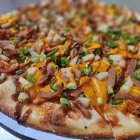 The newest VEGAN addition to the menu....
Sweet Baby Rays, V-Pork, V-sharp cheddar, fresh jalapenos, pineapple, finished with green onion at Task Force Pizza Co in Fort Walton Beach