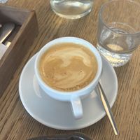 Oat milk flat whitee  at SANDHOLT in Reykjavik