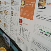 Outside stating that they have a vegan menu. at Soup N Tap in Eastbourne